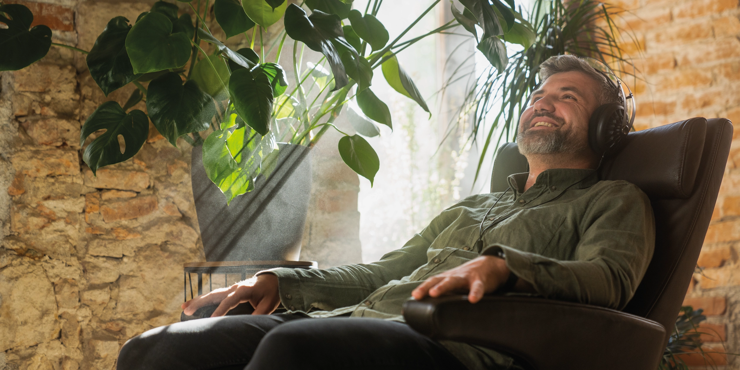 Man listening to Meze Audio premium headphones open-back dynamic driver