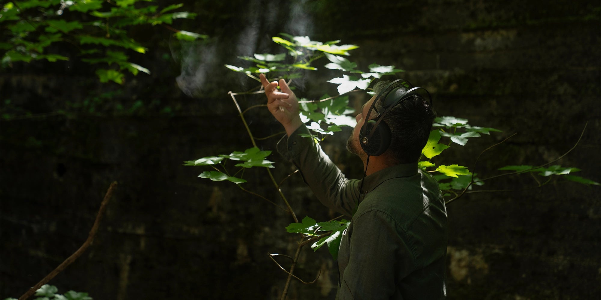 Meze Audio 105 AER best open back hifi audiophile premium headphones worn by man walking in a forest