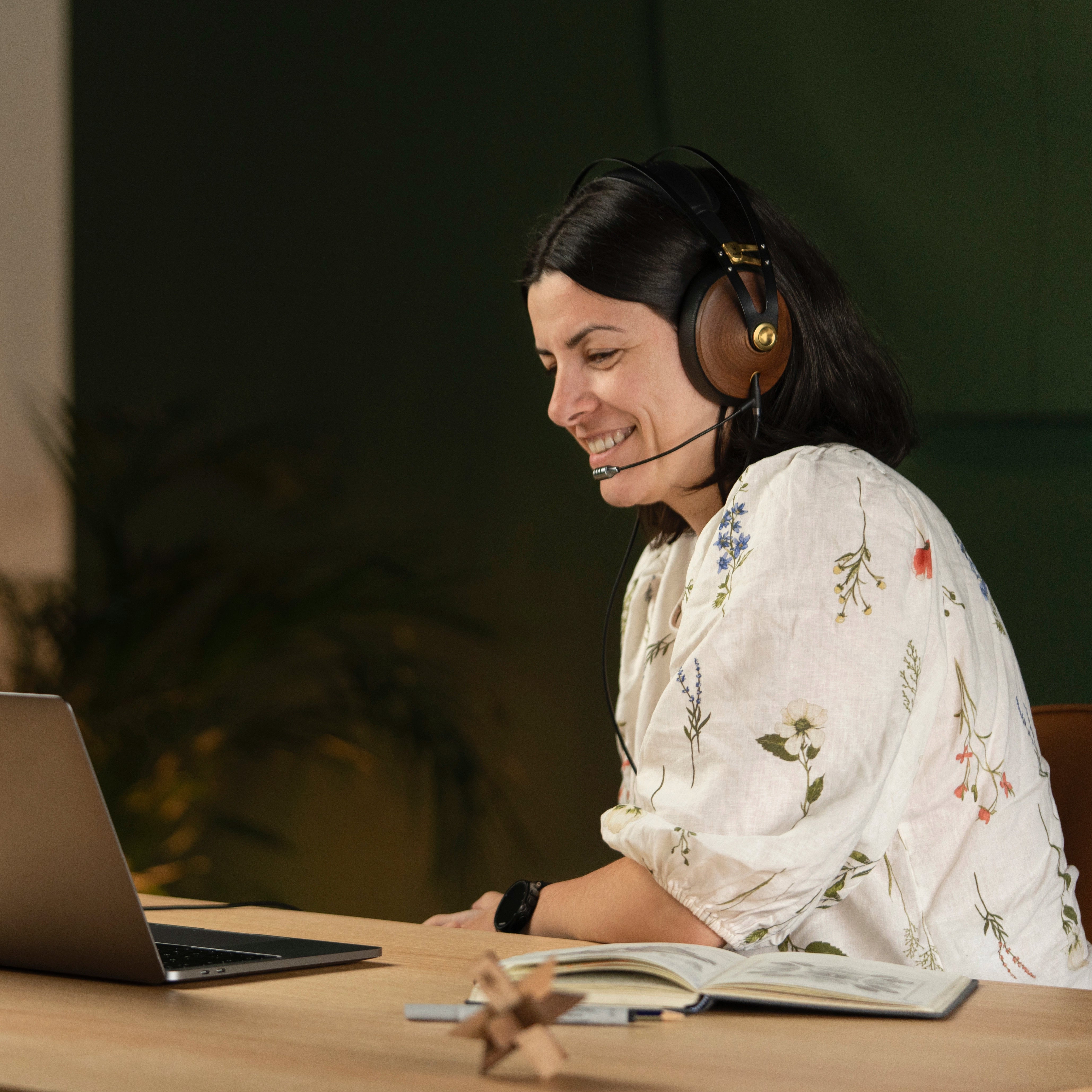 Player using the Meze Audio 99 Classics Walnut Gold dynamic driver closed-back audiophile gaming headset during a remote work call