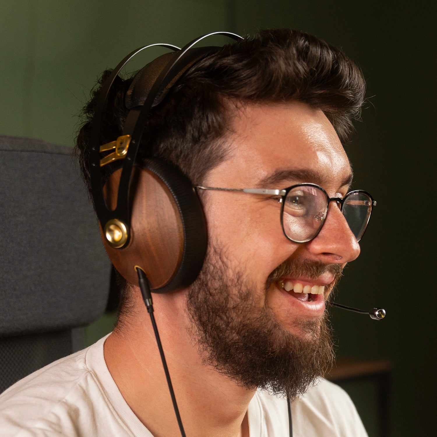 Player enjoying the Meze Audio 99 Classics closed-back dynamic driver audiophile gaming headset